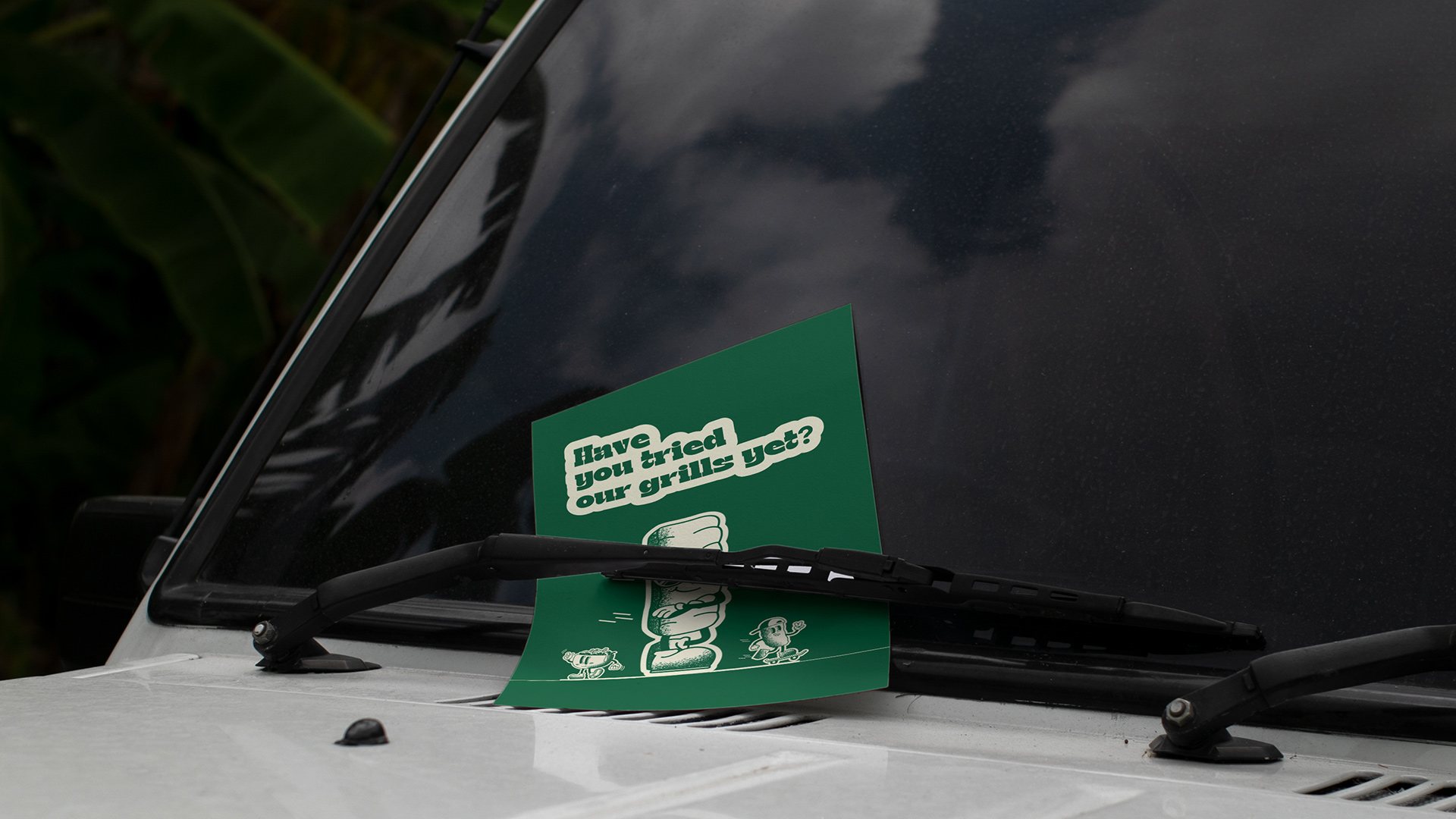 منشور Kuftaway على زجاج سيارة بعبارة Have you tried our grills yet?